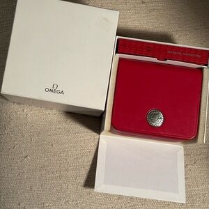 Omega Red leather presentation box with operating instructions booklet